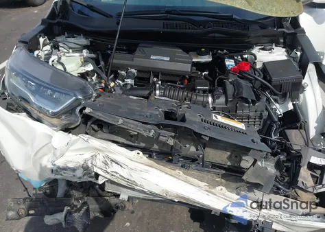 2018 Honda Cr-V Touring z USA, uszkodzony, nr VIN 2HKRW1H93JH518543